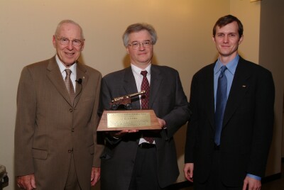 Apollo 13 astronaut James Lovell, Jim Plaxco, and NSS Executive Director George Whitesides and the Heinlein Award