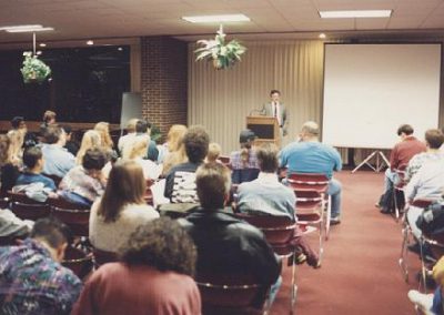 Jim Plaxco introducing Space Shuttle Astronaut Dr. Byron Lichtenberg to an audience at Harper College - Oct. 1993.