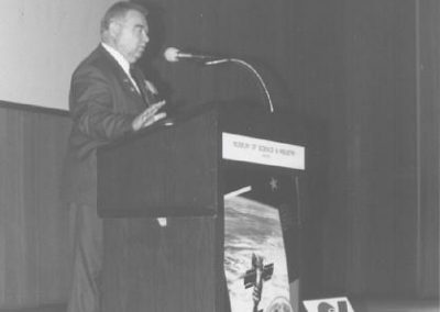 Cosmonaut Georgi Grechko speaking to an audience at Chicago's Museum of Science and Industry as part of a CSSS sponsored speaking tour of Chicago in April 1993