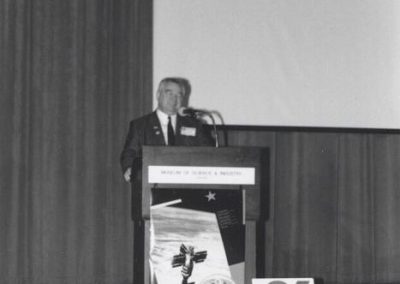 Cosmonaut Georgi Grechko speaking to an audience at Chicago's Museum of Science and Industry as part of a CSSS sponsored speaking tour of Chicago in April 1993