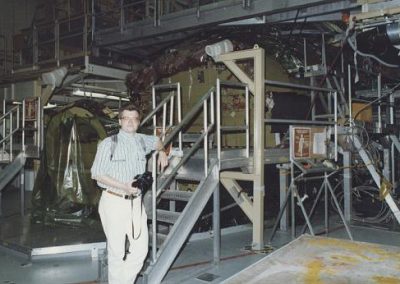 Jim Plaxco in front of the under-construction Space Shuttle Endeavour at Rockwell's Palmdale CA facility - May 1990