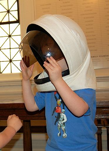 Trying a space helmet on for size at the Music Institute of Chicago Blast Off Concert - Sept. 2007