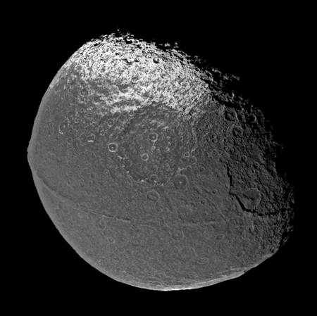 Figure 6. Cassini images Iapetus with the 'bellyband' extending along the moon's equator